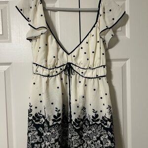 Anthropologie Black and Off-White Flutter Sleeve Blouse with Tie Front